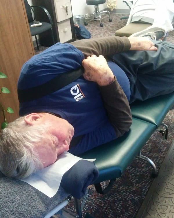 Patient receiving chiropractic care at Dancingspine