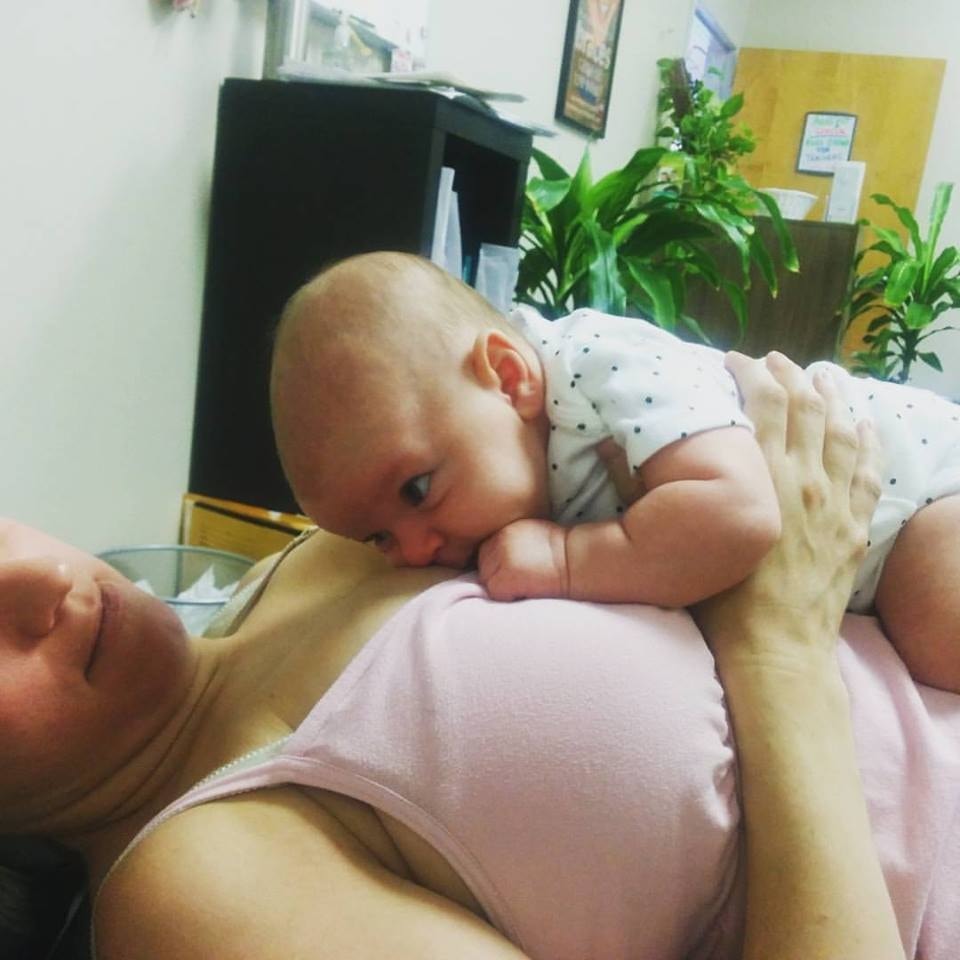 Mother and baby receiving chiropractic care at Dancingspine